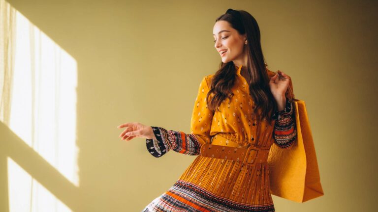 young-woman-with-shopping-bags-beautiful-dress (1)